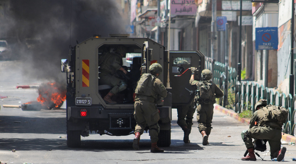 Israeli forces, settlers clash with Palestinians in West Bank following Hamas leader assassination