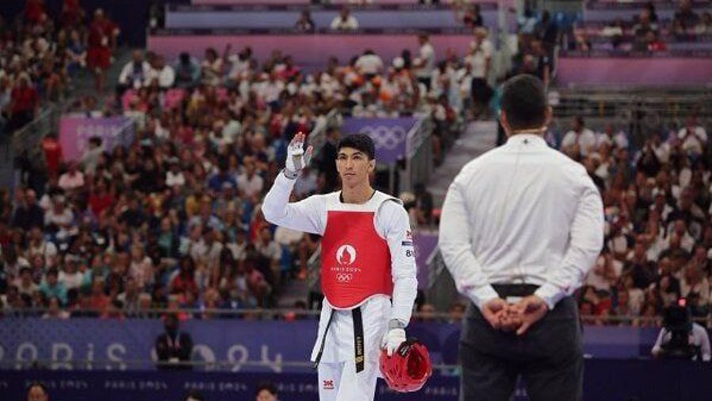 Paris Olympics: Iran’s Salimi overcomes odds to cruise into taekwondo +80kg final