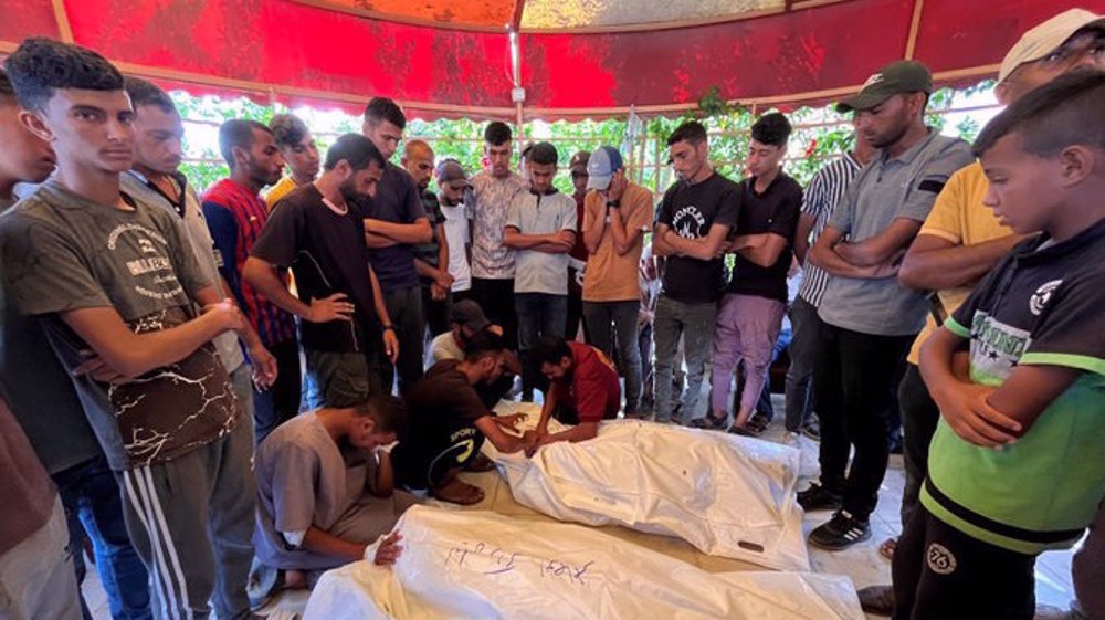 Scores killed as Israel bombs schools, houses across Gaza