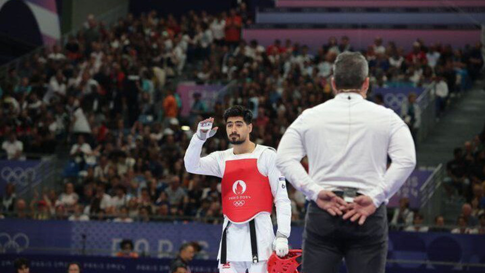 Iranian taekwondo star Barkhordari's dream run in Paris Olympics ends with silver