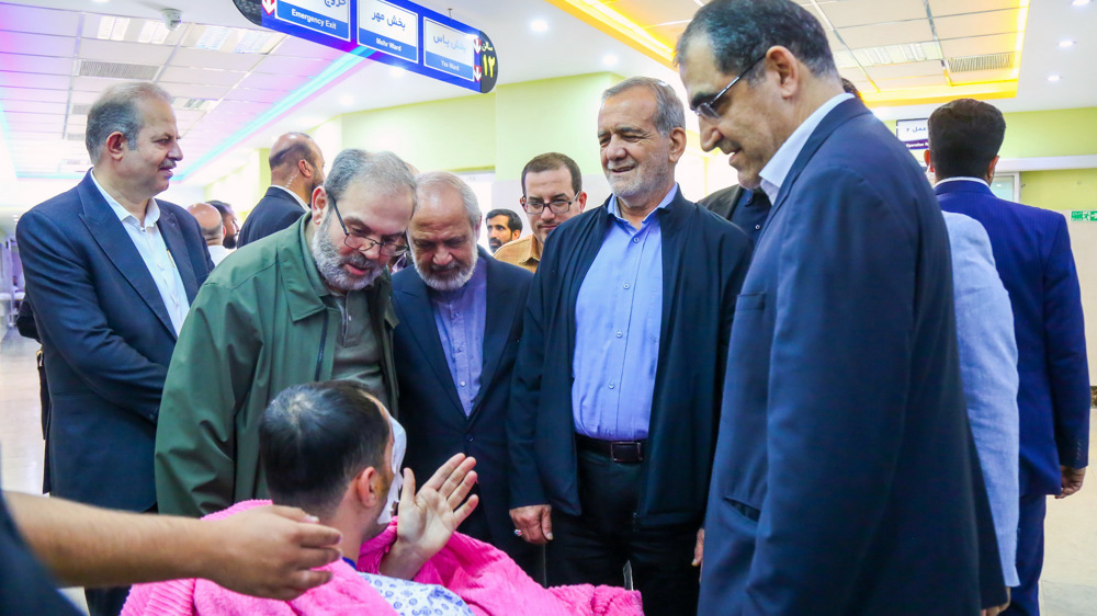 President Pezeshkian visits victims of Lebanon blasts in Tehran