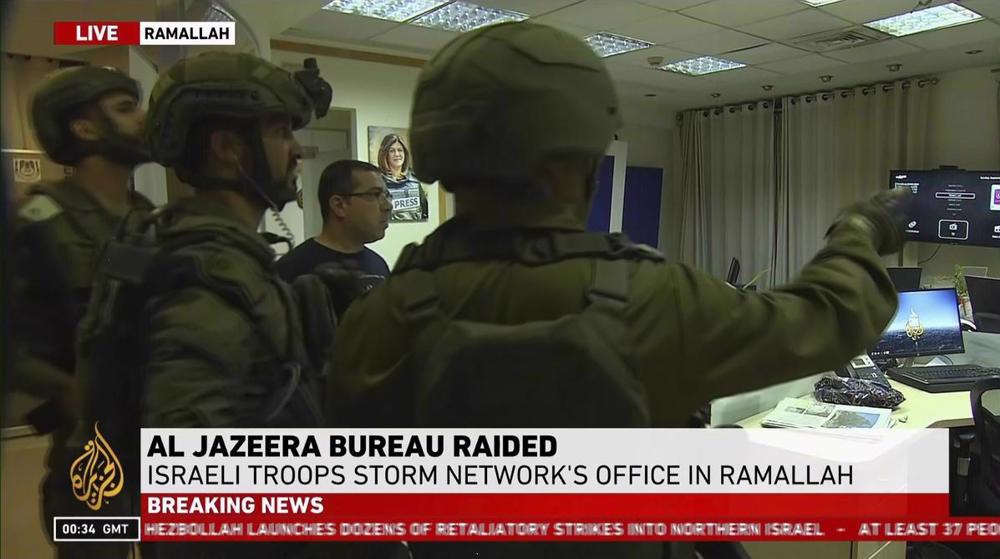 Israeli forces raid, shutter Al Jazeera office in Ramallah	