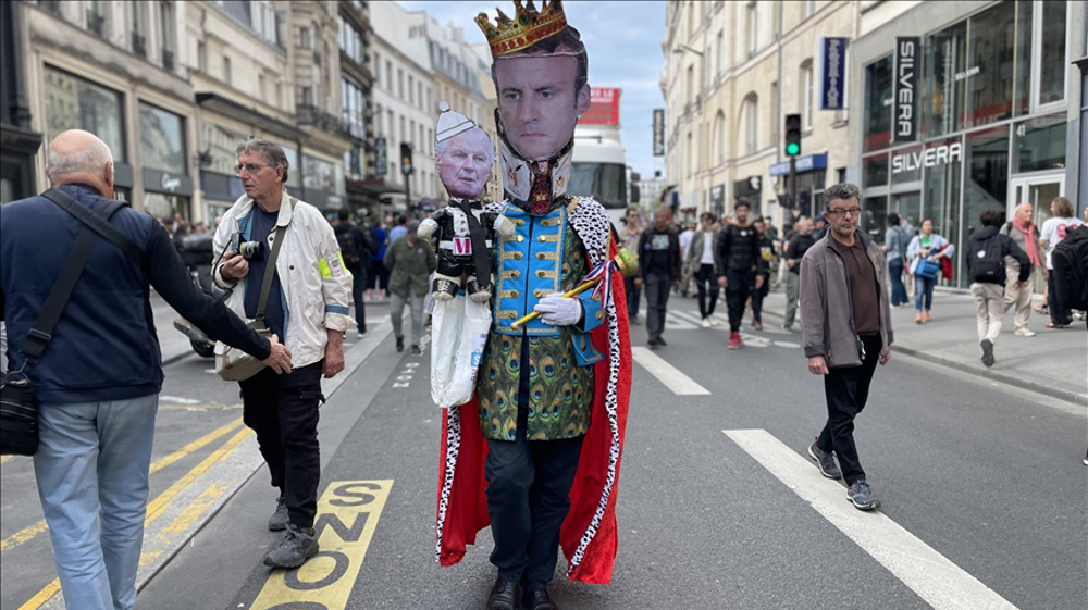 Thousands of French protesters demand Macron's resignation