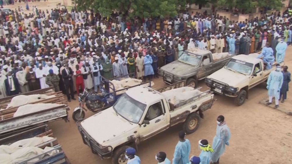 Nigeria holds mass funeral for dozens killed in Boko Haram attack