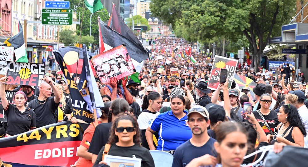 Tens of thousands rally in Sydney to mark Invasion Day