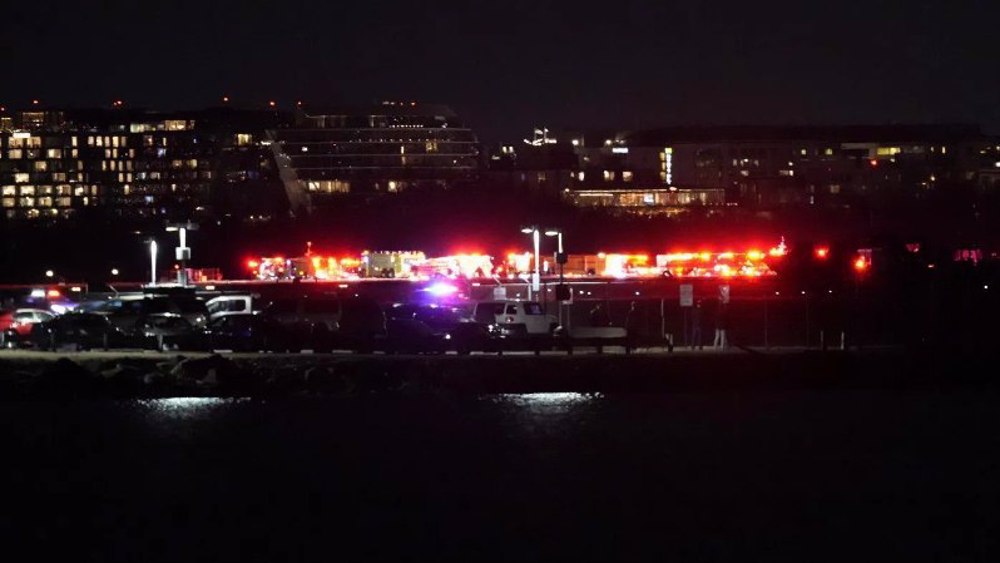 Fatalities reported as US passenger jet, military chopper collide near Reagan Airport