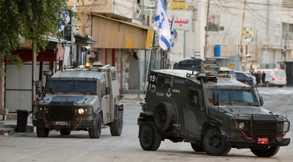 Israeli forces injure two Palestinians as regime expands West Bank raids