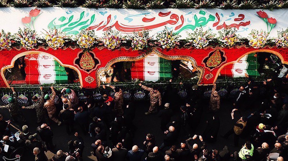 Iran holds mass funeral procession for 300 unidentified martyrs