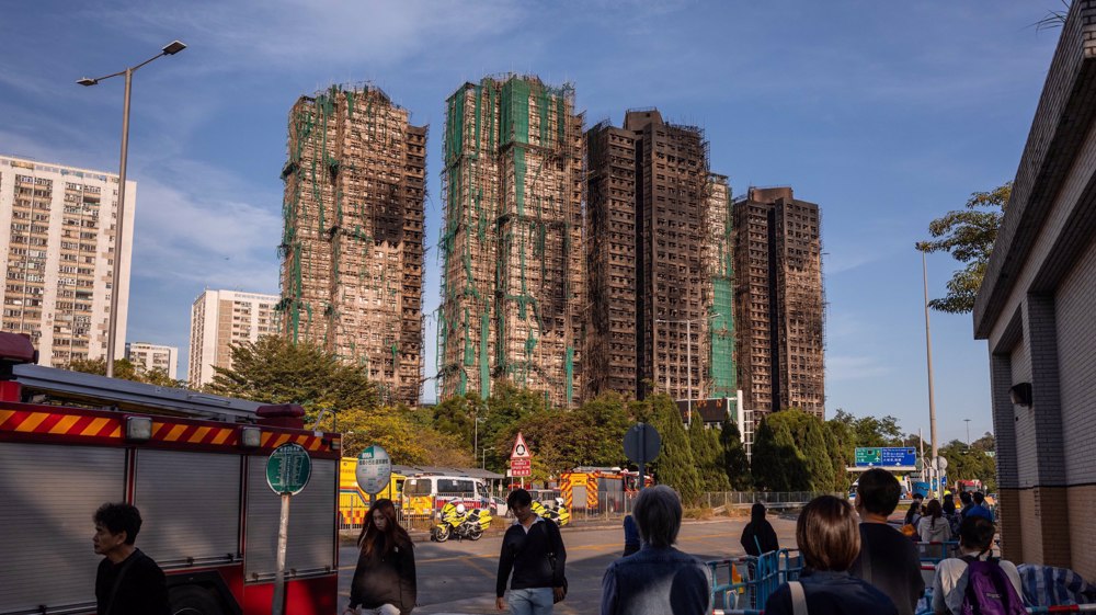 Hong Kong arrests 8 after deadly tower blaze that left 128 dead