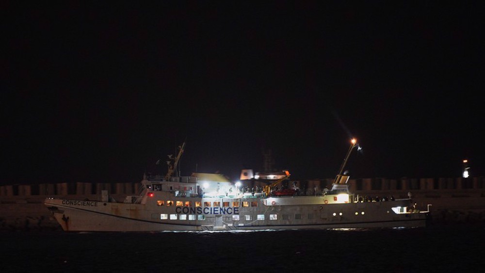 US Rep. Ilhan Omar (D-MN) (L) talks with Speaker of the House Nancy Pelosi (D-CA) during a rally with fellow Democrats before voting on H.R. 1, or the People Act, on the East Steps of the US Capitol on March 08, 2019 in Washington, DC. (AFP photo) 