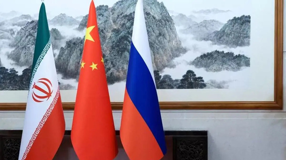 US Rep. Ilhan Omar (D-MN) (L) talks with Speaker of the House Nancy Pelosi (D-CA) during a rally with fellow Democrats before voting on H.R. 1, or the People Act, on the East Steps of the US Capitol on March 08, 2019 in Washington, DC. (AFP photo) 