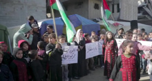 Gaza children at Al-Nour school call for caravans to restore education