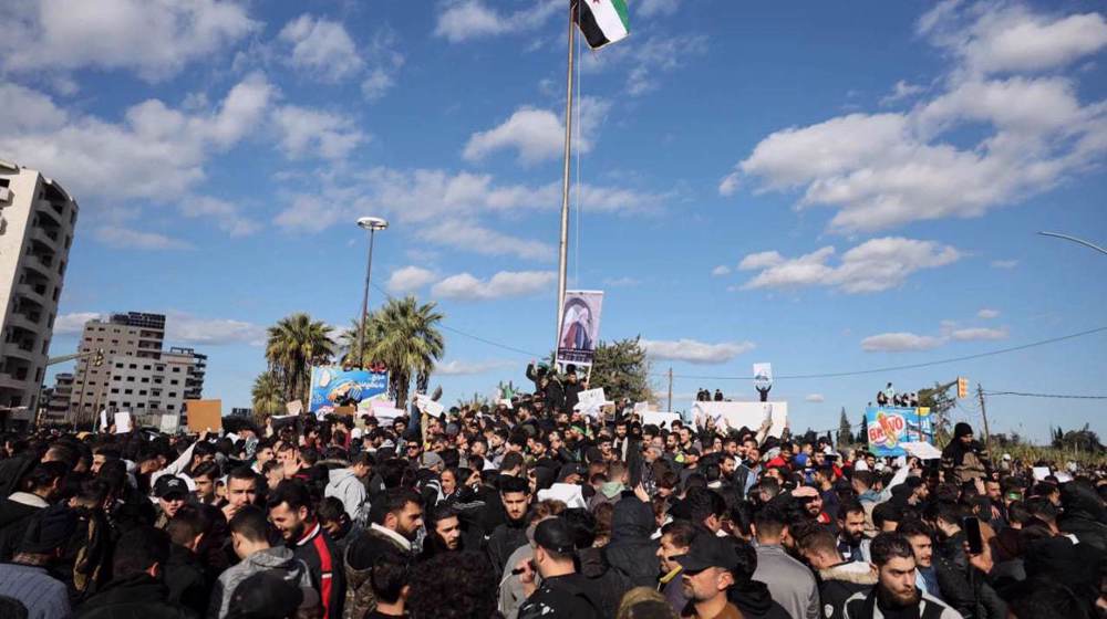 Alawites demonstrate in Syria after deadly Homs mosque bombing 