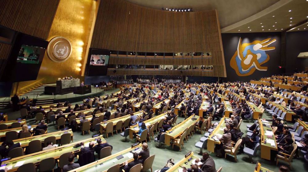 US Rep. Ilhan Omar (D-MN) (L) talks with Speaker of the House Nancy Pelosi (D-CA) during a rally with fellow Democrats before voting on H.R. 1, or the People Act, on the East Steps of the US Capitol on March 08, 2019 in Washington, DC. (AFP photo) 