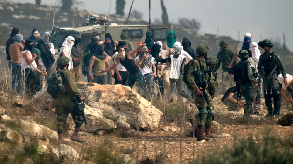 US Rep. Ilhan Omar (D-MN) (L) talks with Speaker of the House Nancy Pelosi (D-CA) during a rally with fellow Democrats before voting on H.R. 1, or the People Act, on the East Steps of the US Capitol on March 08, 2019 in Washington, DC. (AFP photo) 