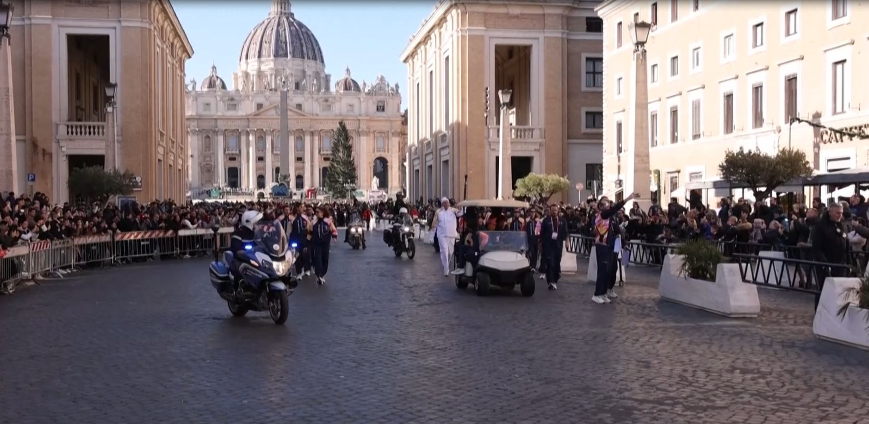 Olympic flame travels through the streets of Rome and Vatican