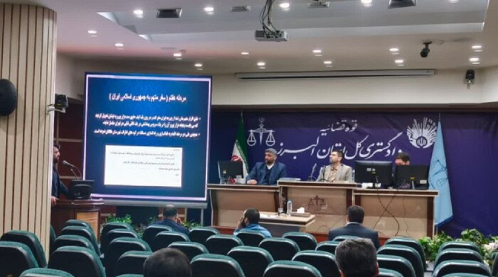 Iran begins trial of dual national charged with spying for Israel 