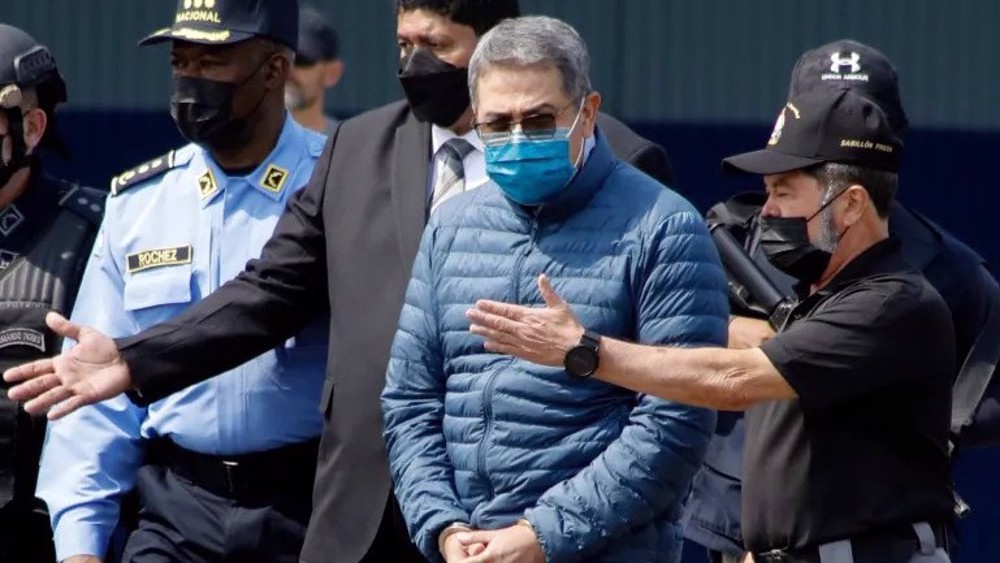 Honduras issues arrest warrant for ex-president pardoned by Trump