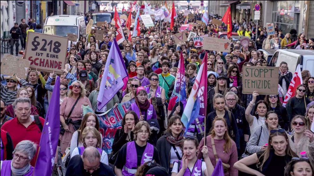 Clashes erupt as thousands march on International Women’s Day in Paris