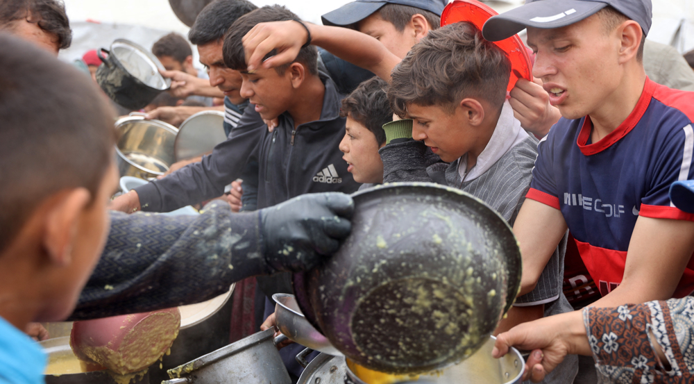 New Canadian FM: Israel uses lack of food as weapon