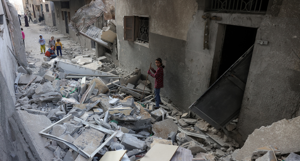 Israel bombs Gaza journalist's home, killing 8 family members