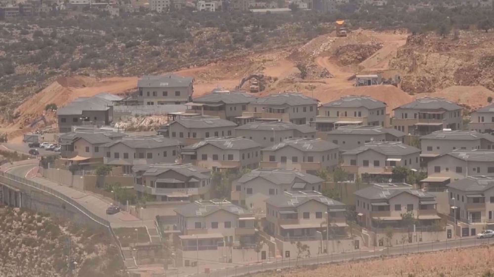 Israel legalizes settler outposts as it grabs more Palestinian land