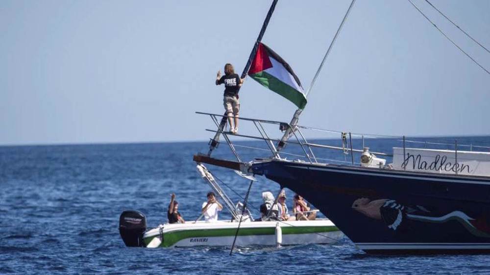 Aid flotilla approaches Gaza coast despite Israel's threats