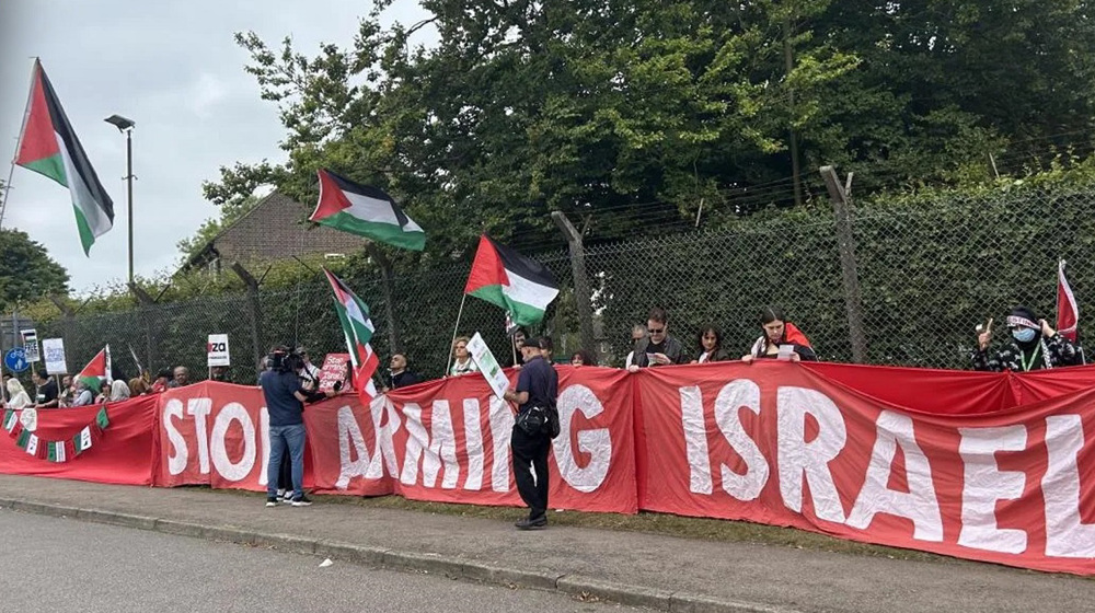 Thousands surround UK air force base over Gaza genocide complicity