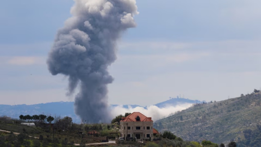 Israel bombs southern Lebanon, wounds four Syrian workers