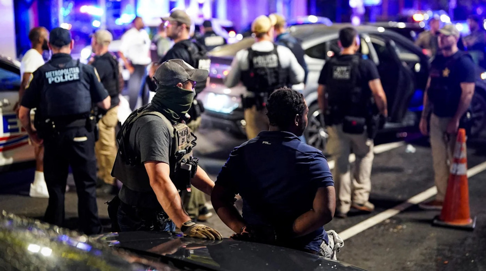 Hundreds arrested as Trump intensifies militarization of US capital