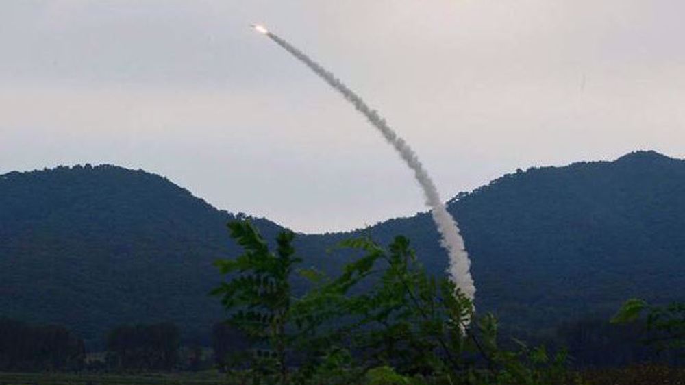 North Korea leader supervises test of new, advanced missile system