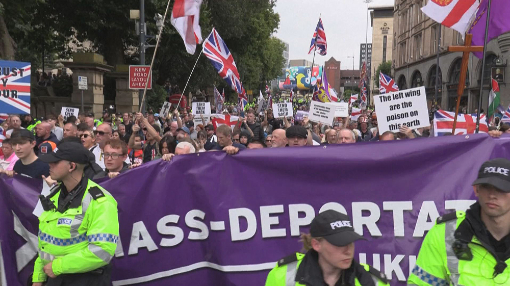 Anti-immigrant protesters, counter-protesters face off in Liverpool