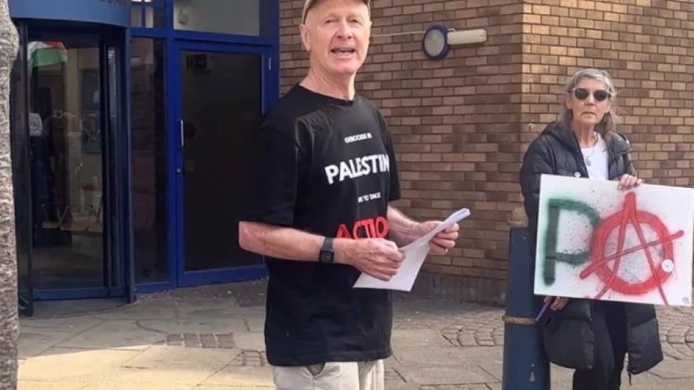 UK police arrest award-winning Scottish screenwriter over anti-genocide T-shirt