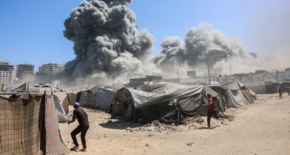Israel levels Gaza City tower as it steps up forced displacement of Palestinians