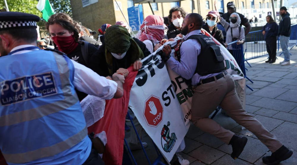 Thousands protest Israeli arms firms at London fair, visit by Herzog 