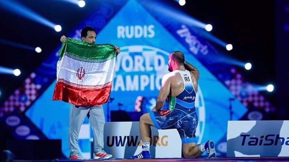 Iran's national freestyle wrestling team becomes world champion after 12 years
