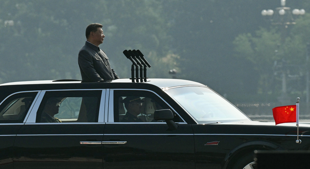 China's Xi presides over massive military parade, urges shared future for humanity