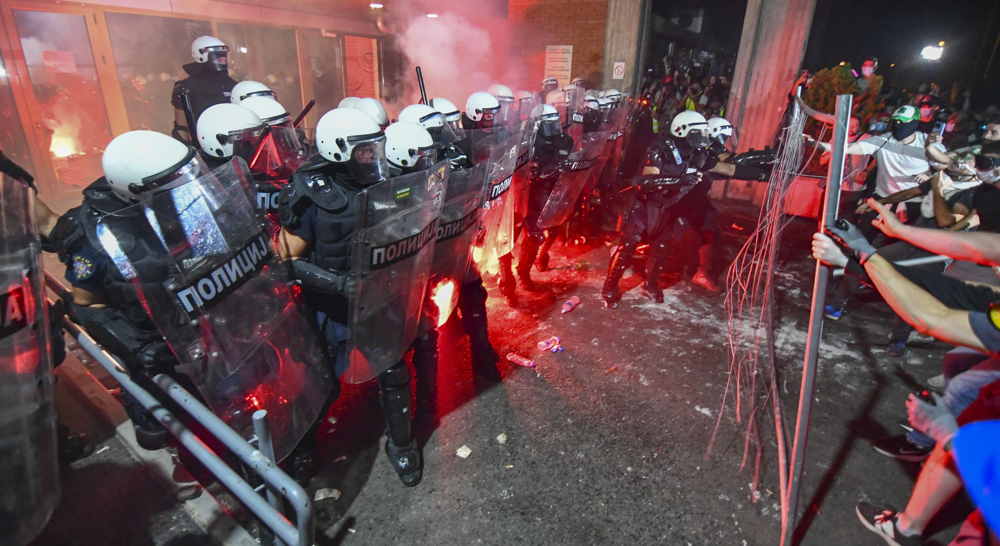 Police use tear gas to disperse Serbia anti-government protesters