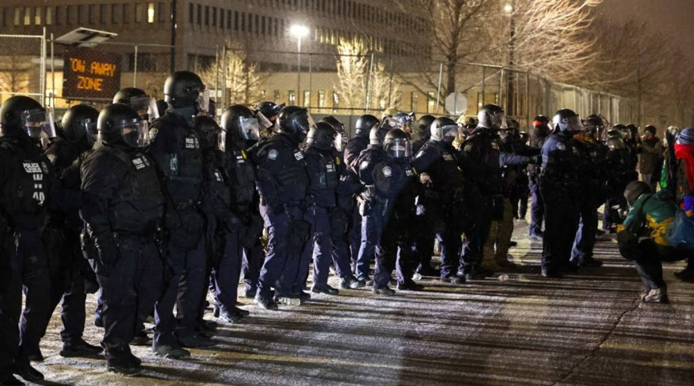US judge bars federal agents from pepper spraying, arresting protesters in Minnesota