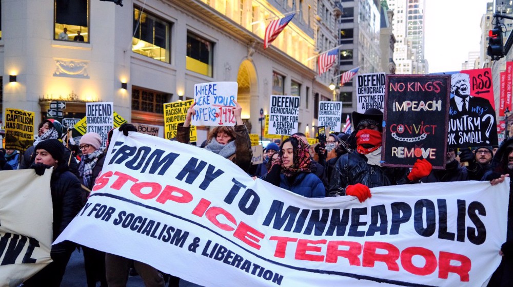 Thousands protest Trump’s immigration policies on second term anniversary