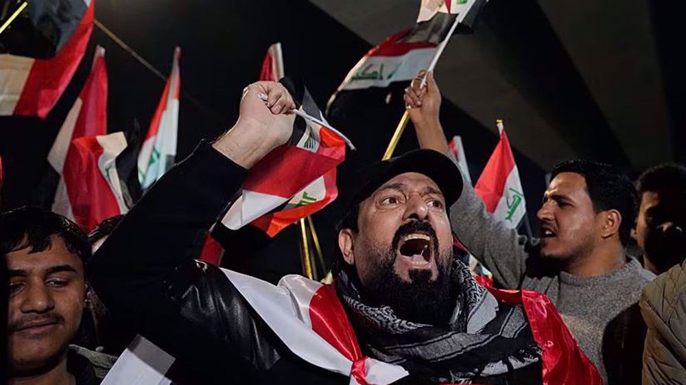  Angry Iraqis set fire to Trump image, US flag