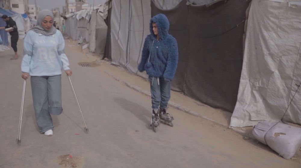 Palestinian athlete and daughter hope to return to the track despite amputation