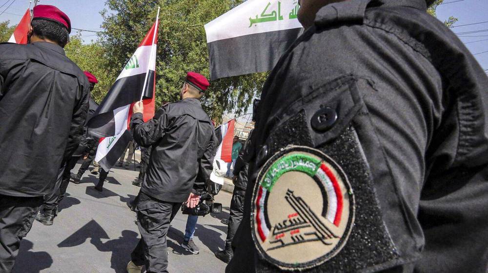 Iraq blasts deadly US-Israeli strikes on anti-terror PMU fighters