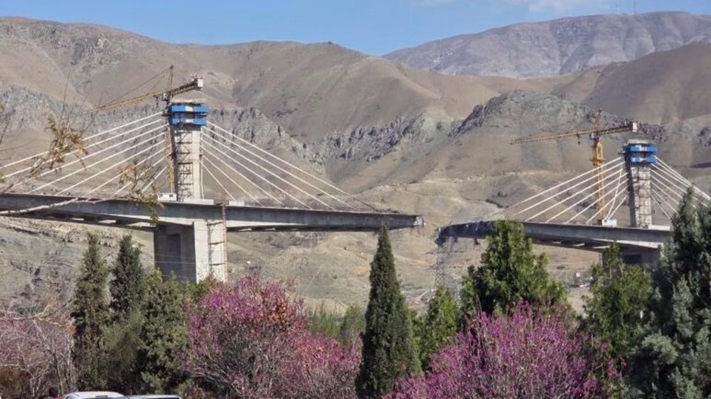 Trump flaunts his war crimes as Iranian bridges, health centers are bombed