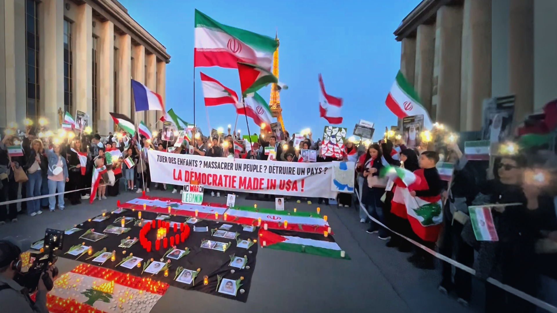 People in Paris show solidarity with victims of war on Iran, Lebanon 