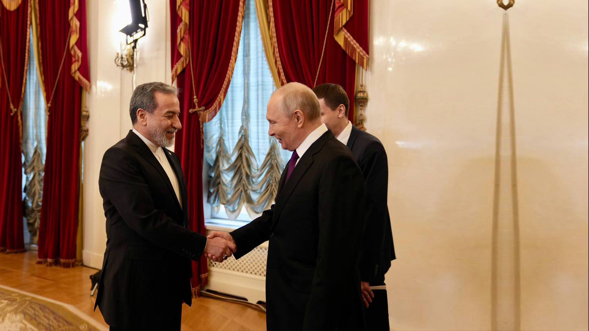 Iran top diplomat, Russian president meet in St. Petersburg 