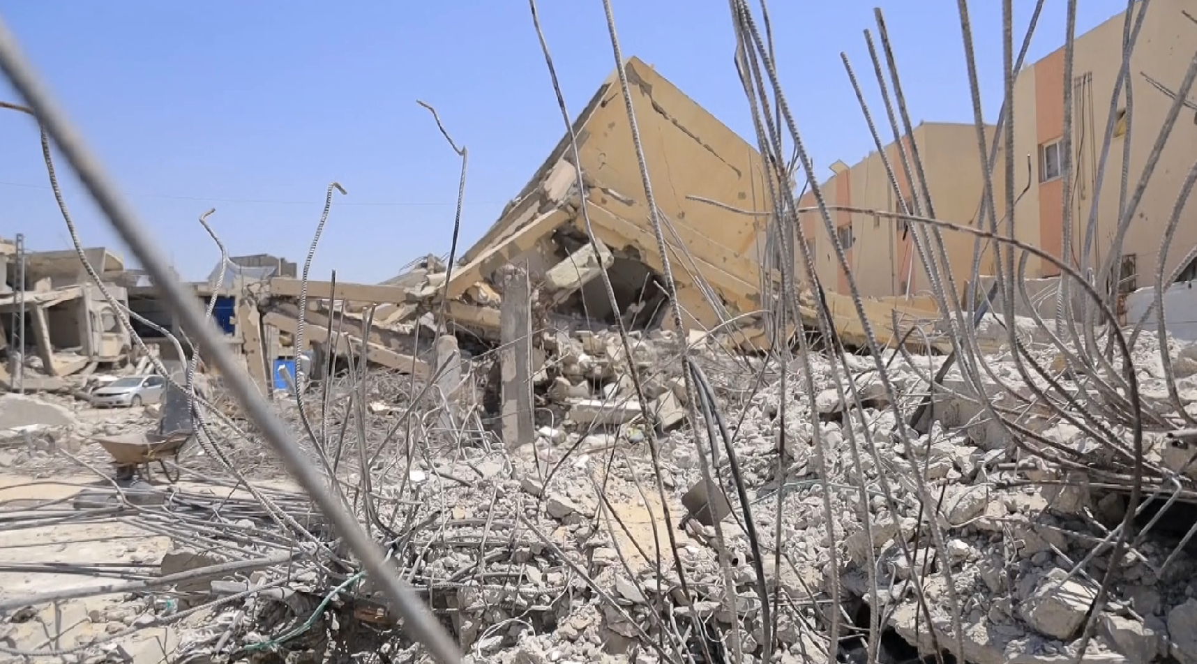 Palestinians in Gaza repurpose ruined steel into fragile shelters