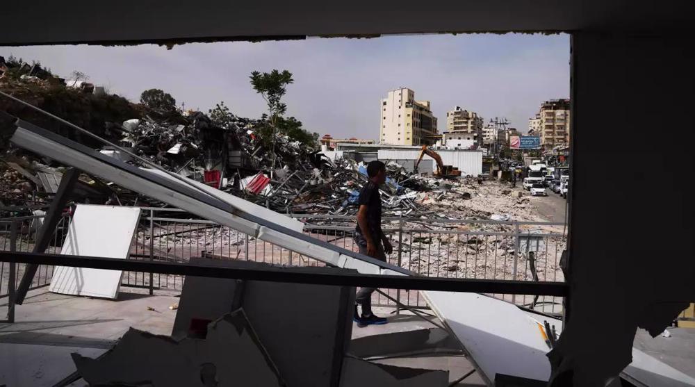 Israel razes dozens of Palestinian shops to pave way for illegal settlement road