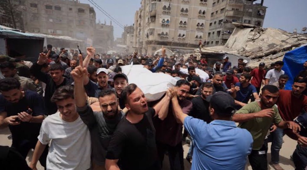 Israeli strikes kill family of three, five police officers in central Gaza