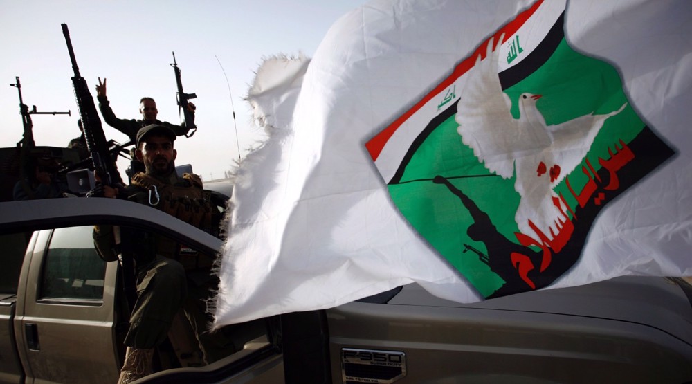 Top Iraqi Shia cleric announces integration of armed group into state forces
